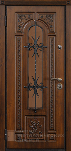Фото «Дверь с ковкой №7»  в Москве